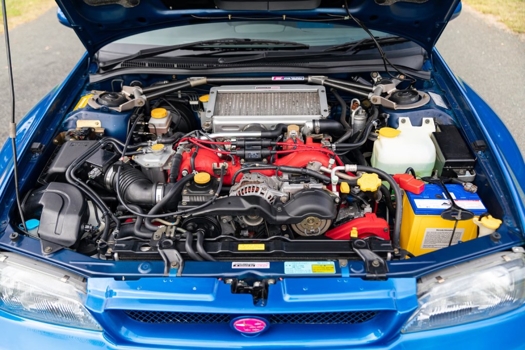 A blue 1998 Subaru Impreza 22B STi's engine bay