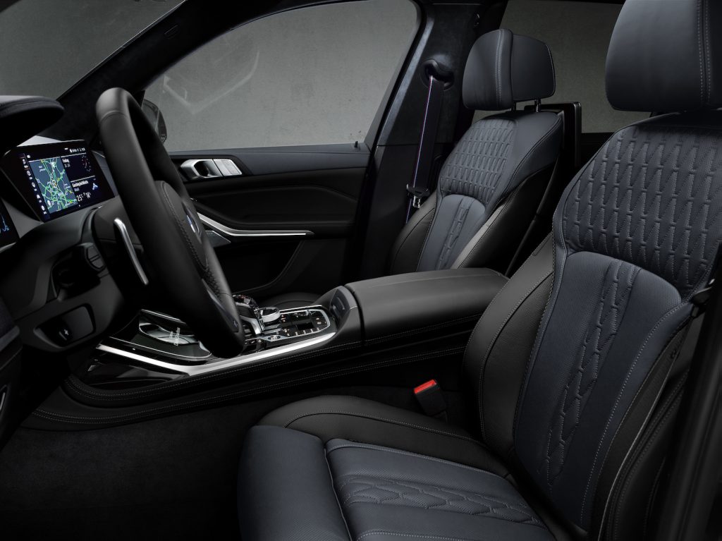 This is a black leather interior in a BMW X7 luxury suv.