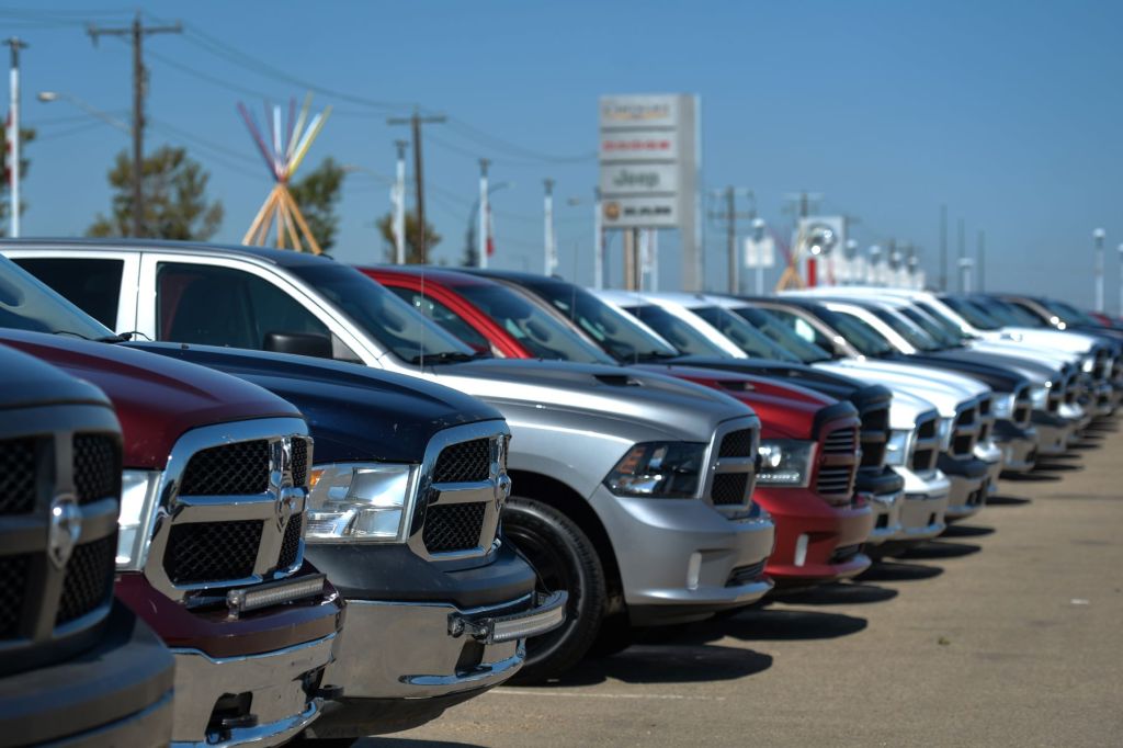 A lineup of Ram trucks at a CDJR car sales dealership - you can't forget these vital things.