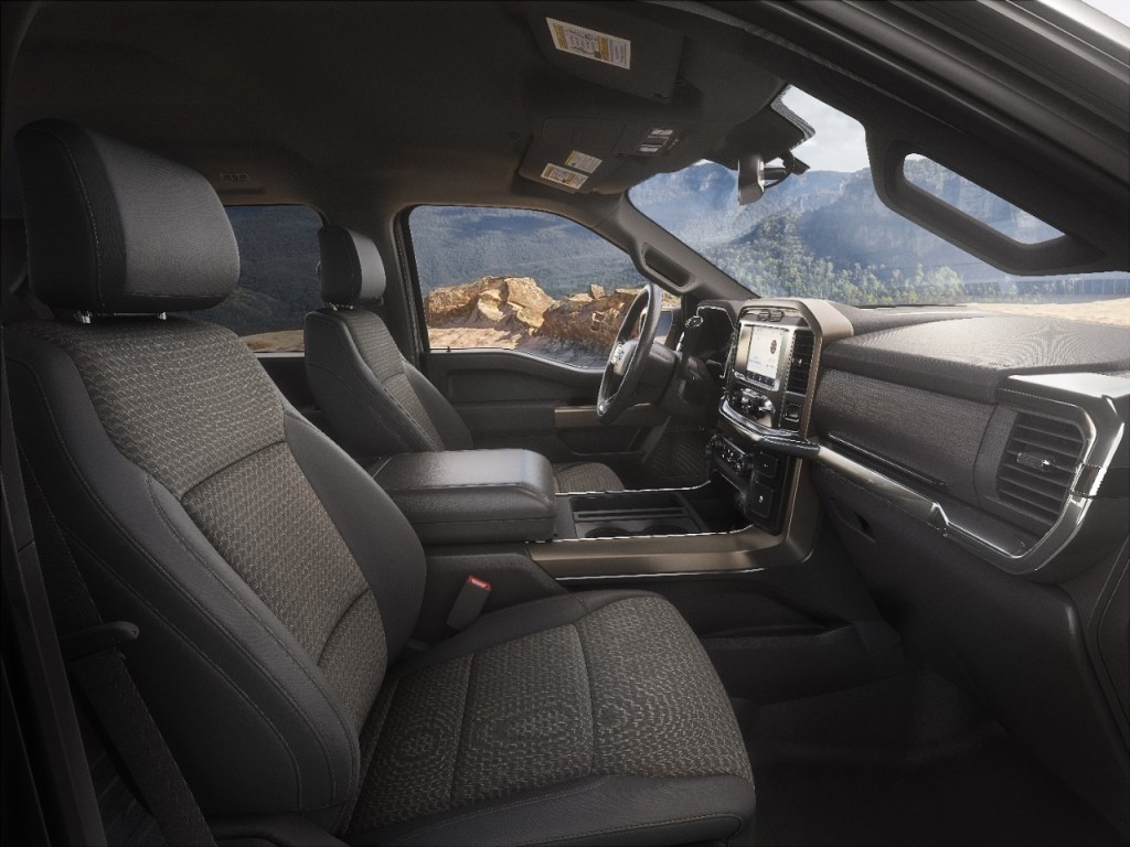 Dashboard and front seats in 2023 Ford F-150 Rattler, highlighting its release date, price, and features