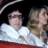 Elvis Presley with girlfriend Linda Thompson riding in a car after a concert in March 1976