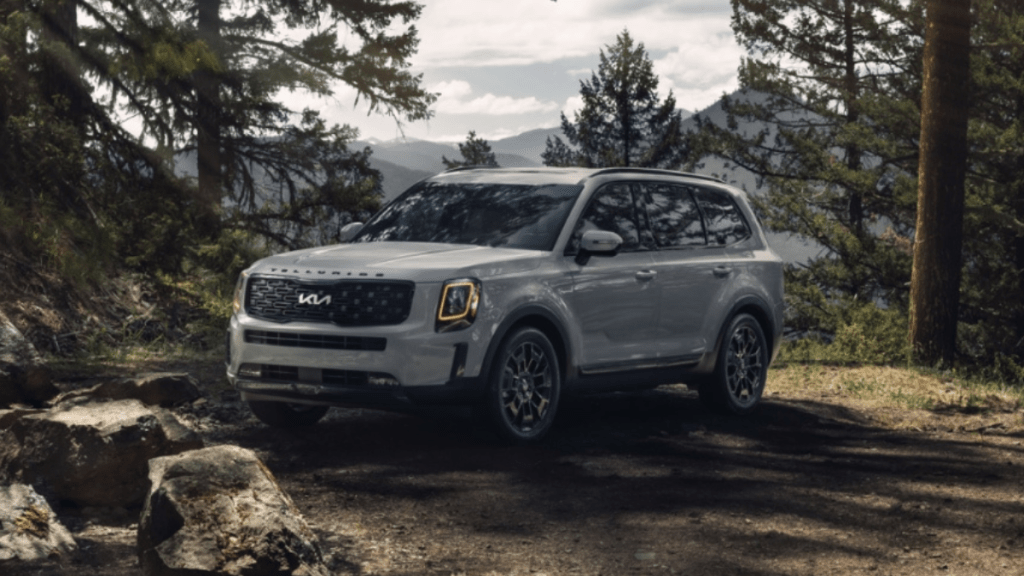 Everlasting Silver 2022 Kia Telluride parked in a forest
