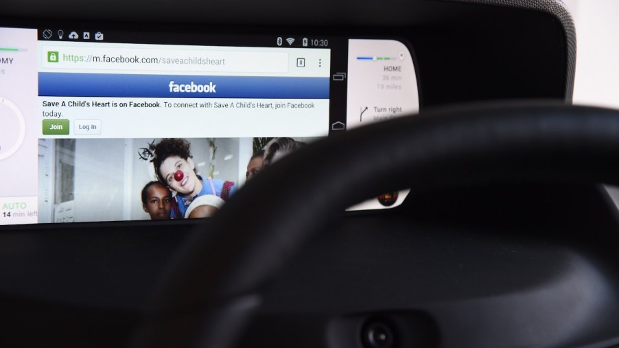 Facebook from a wirelessly connected smartphone in a car
