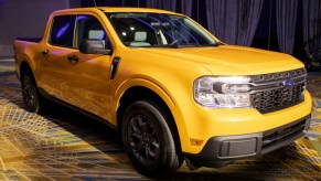 A yellow 2022 Ford Maverick is on display.