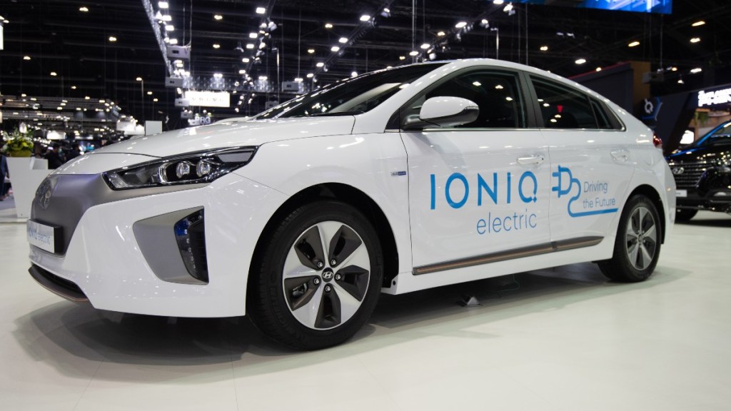 Front angle view of white 2020 Hyundai Ioniq Electric, the KBB best used EV to buy for under $30,000