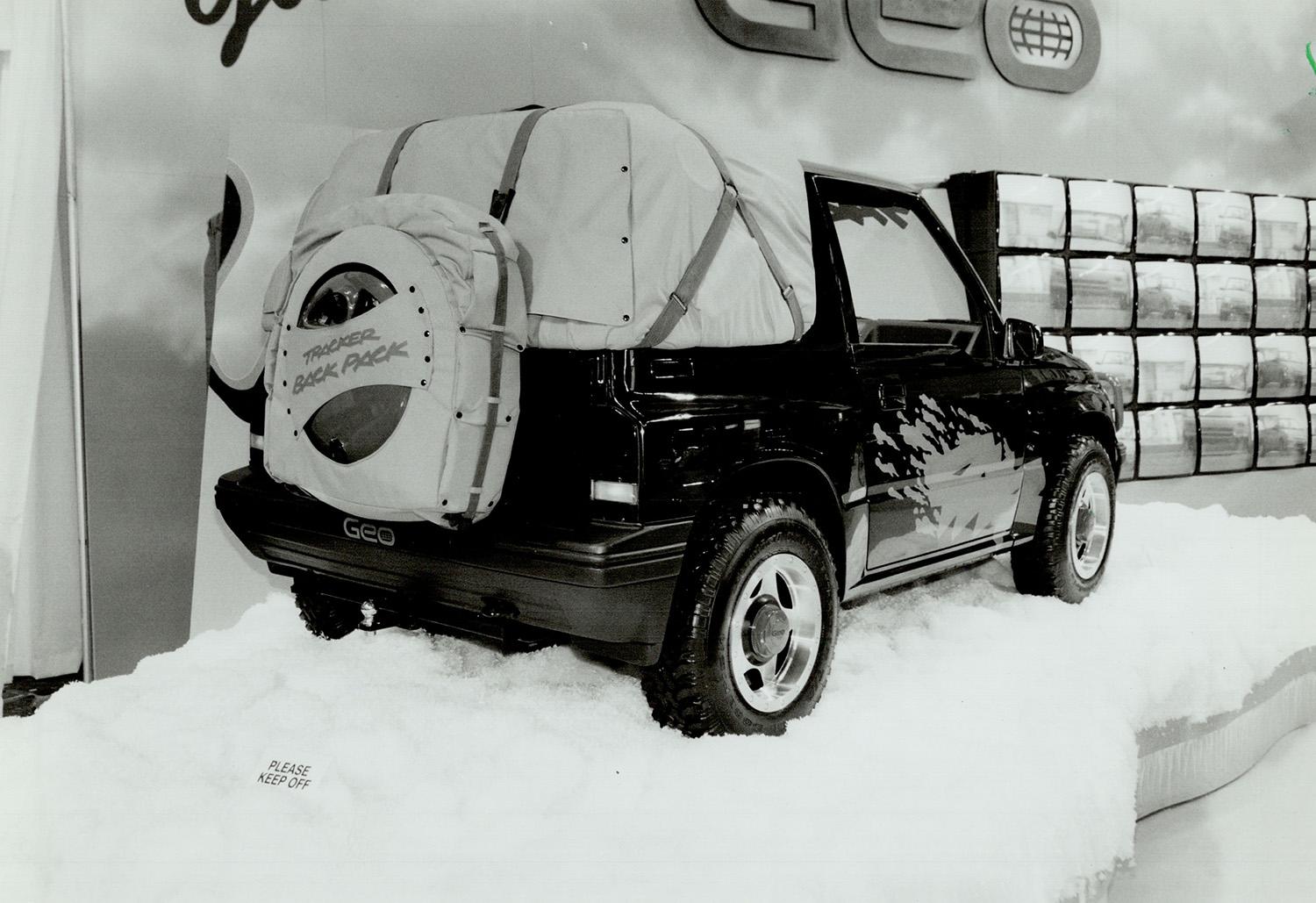 Geo Tracker black and white photo in snow with Tracker backpack accesory