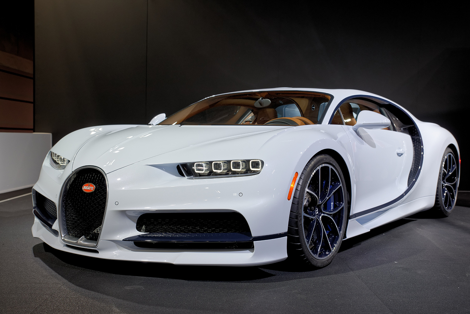 white Bugatti Chiron release with black grille and accents, front three-quarter shot