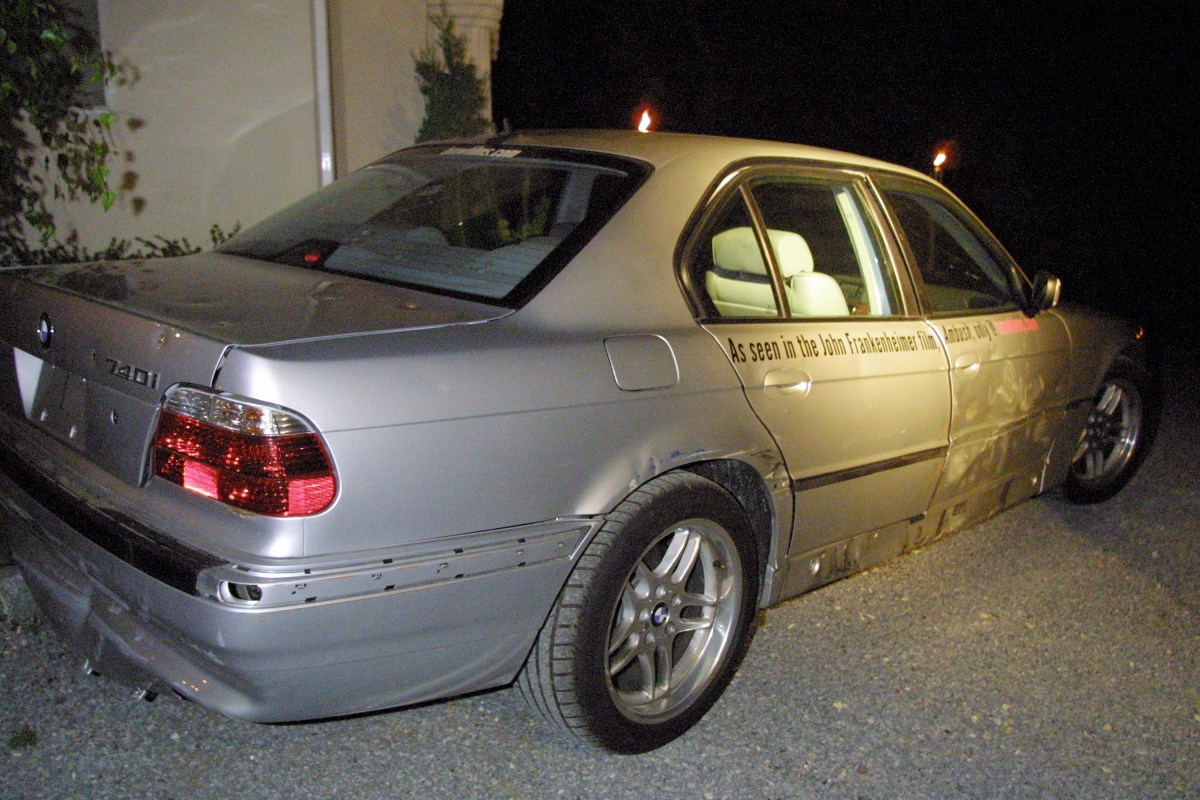 A 3/4 rear view of the silver BMW 7 Series used in the short film Ambush for BMW's The Hire series. 