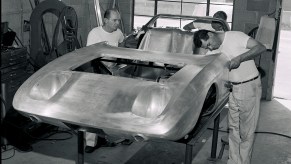 Tom Barnes, at left and Dick Troutman beat out final panels for the first ever Mustang concept car in their Culver City shop