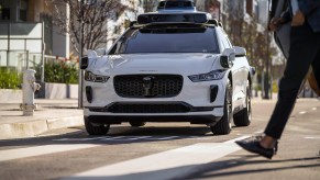 Waymo autonomous self-driving Jaguar I-Pace Electric SUV parked on curb in San Fransisco
