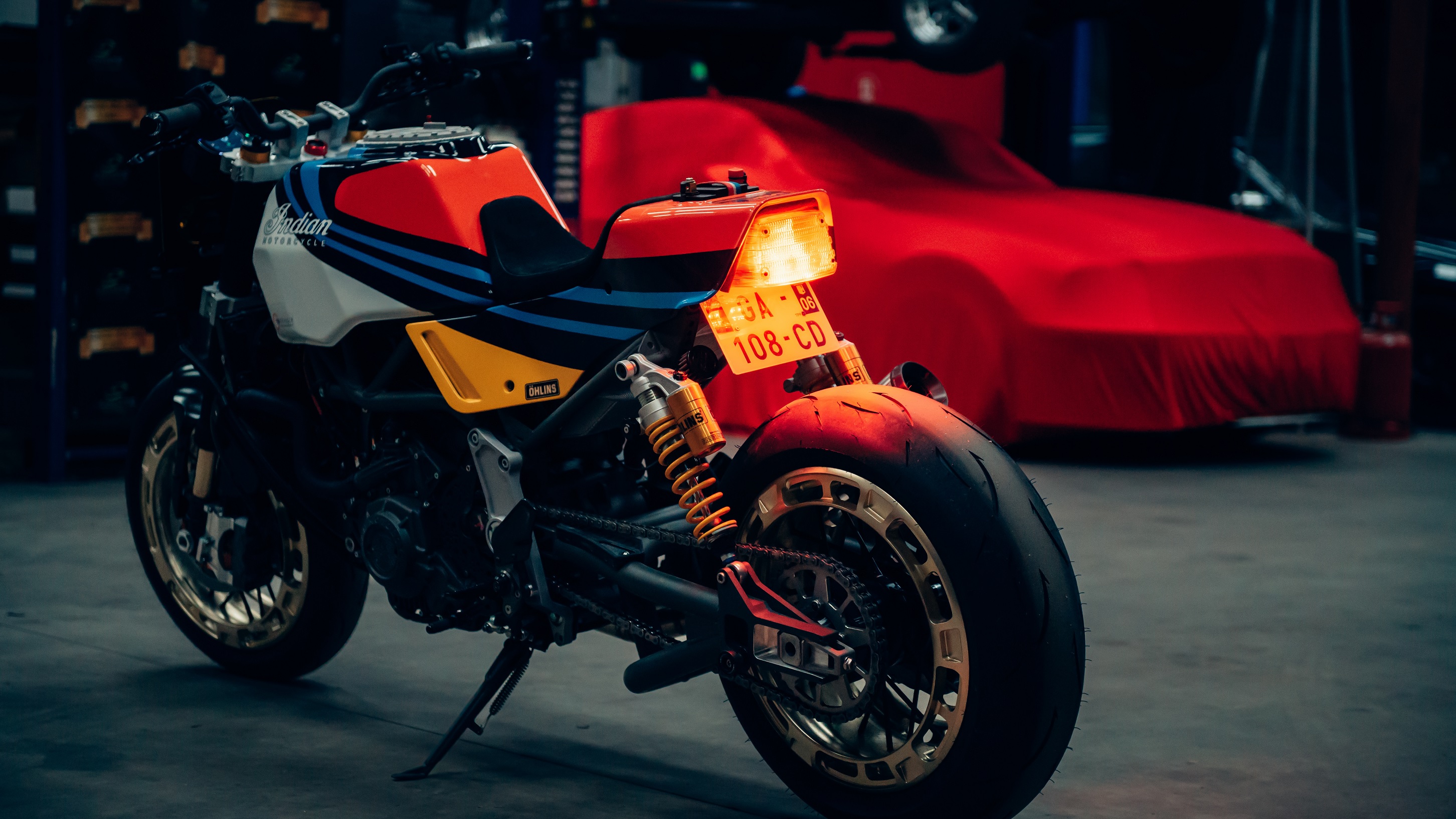 The rear 3/4 view of Workhorse Speed Shop's Martini-liveried Indian FTR AMA