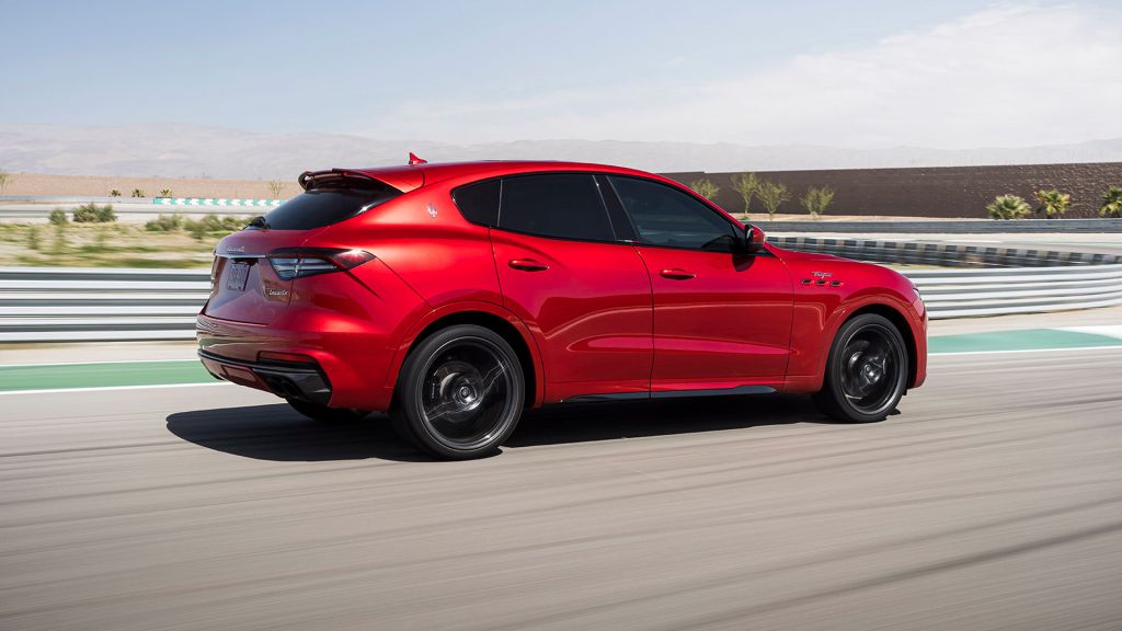 A 2022 Maserati Levante demonstrates its performance and speed on a track, as a performance SUV.