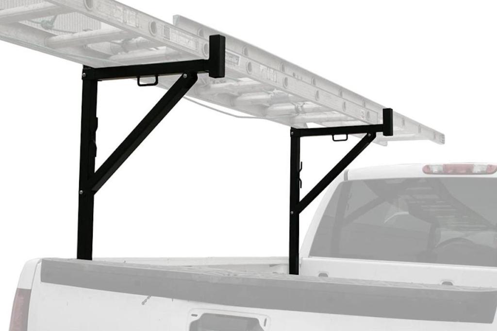 Promo photo of a single-side ladder rack on a blurred-out white pickup truck.