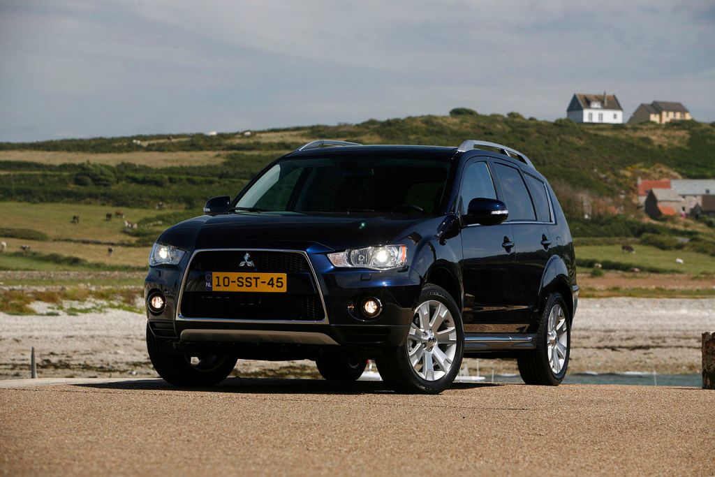 A used Mitsubishi Outlander has three-rows and is relatively affordable in today's market.
