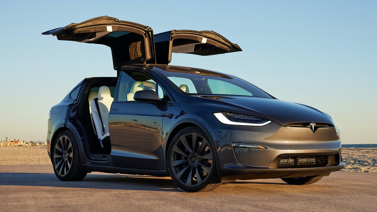 New gray Tesla Model X Plaid that you can win for Omaze contest, with falcon wing doors opened