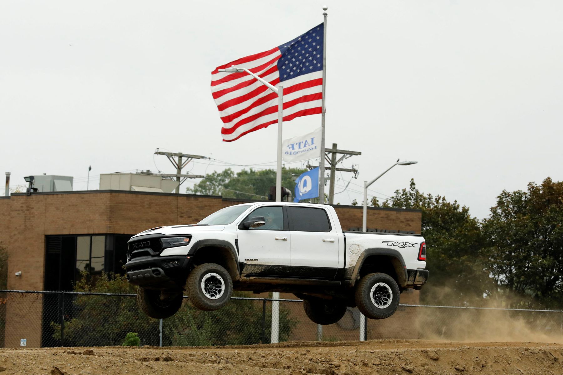Ram 1500 TRX off-road performance truck performing on a test track during the Motor Bella event in Pontiac, Michigan