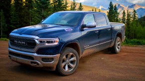 A blue 2022 Ram 1500 full-size pickup truck is parked.