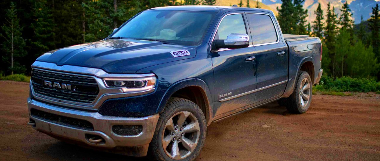 A blue 2022 Ram 1500 full-size pickup truck is parked.