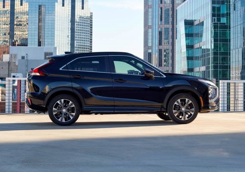 Side view of black Mitsubishi Eclipse Cross, the best SUV to buy used instead of new in 2022 due to high depreciation