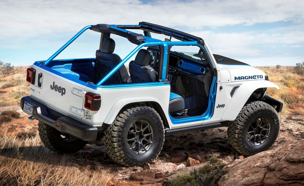Side view of white Jeep Magneto, highlighting release date and price of 2024 Jeep Wrangler EV
