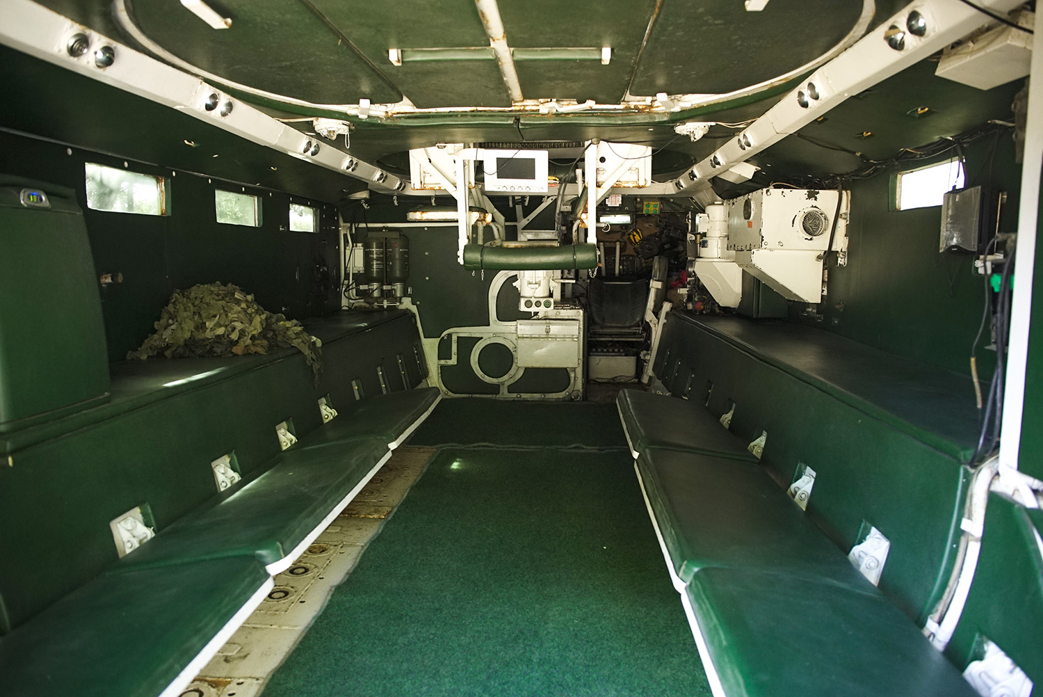 Military green interior of tank limo in UK