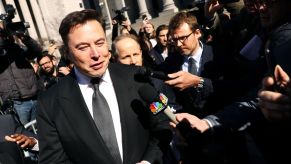 Tesla CEO Elon Musk leaving court after attending a hearing for a tweet on social media