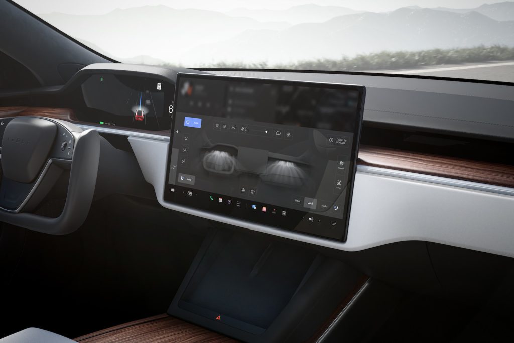 Promo photo of the interior of a brand new Tesla vehicle.