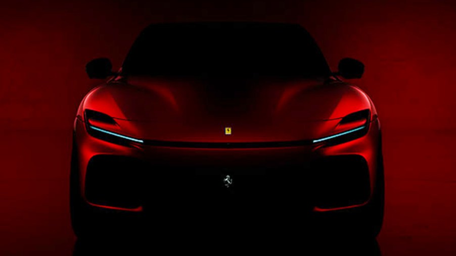 A red Ferrari Purosangue teaser.