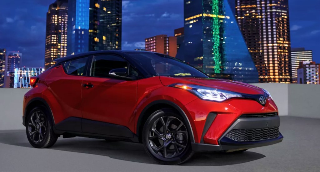 A red 2022 Toyota C-HR subcompact SUV is parked.