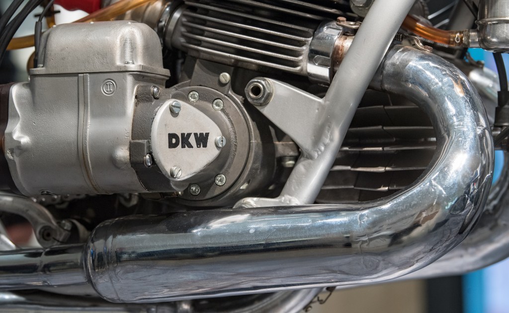A close-up of the exhaust header on a classic DKW 350 RM two-stroke motorcycle