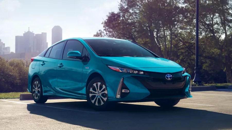 A blue 2022 Toyota Prius Prime is parked.