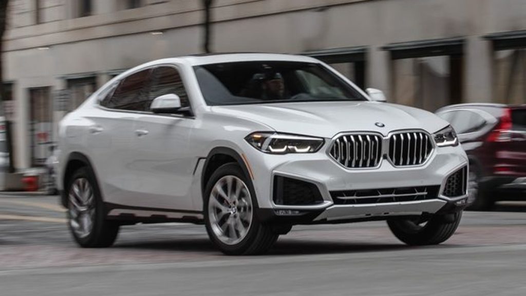 White 2022 BMW X6 on the road