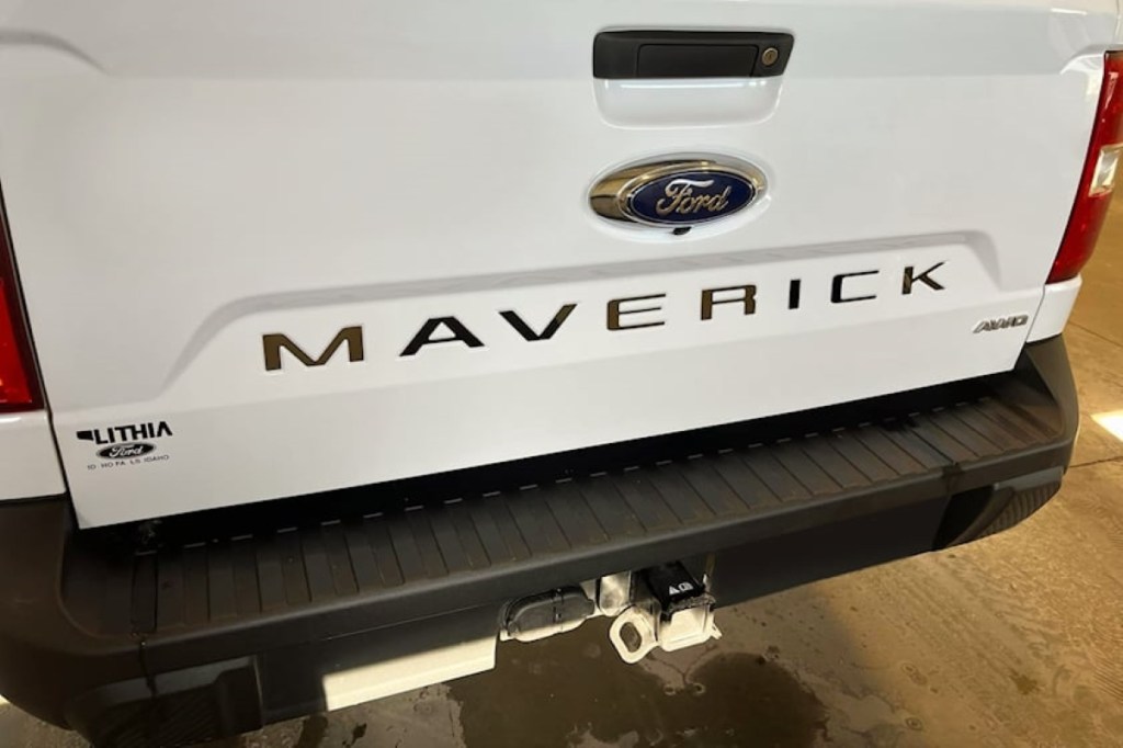 White Ford Maverick with blacked-out lettering, showing ways owners modify the pickup truck