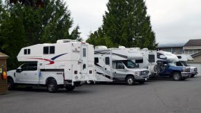 A collection of camper trucks taken by the National Motor Museum