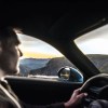 A Porsche driving doesn't wear sunglasses while driving