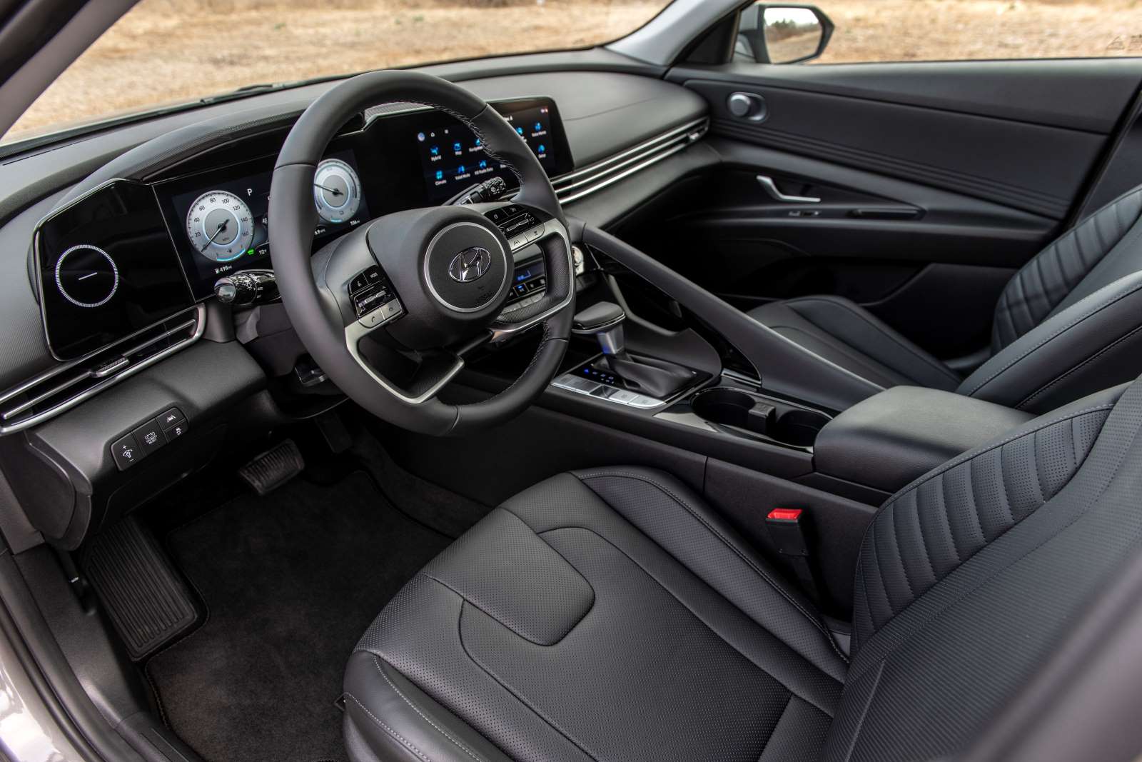 Interior shot of a 2022 Hyundai Elantra Hybrid sedan with a black interior