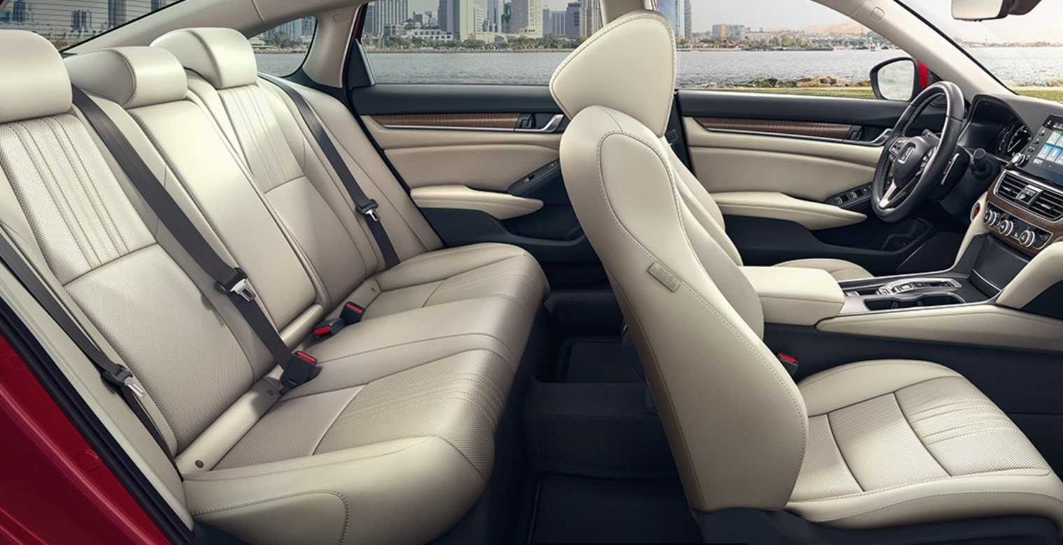 Side interior view of the Honda Accord Touring with leather seats in ivory