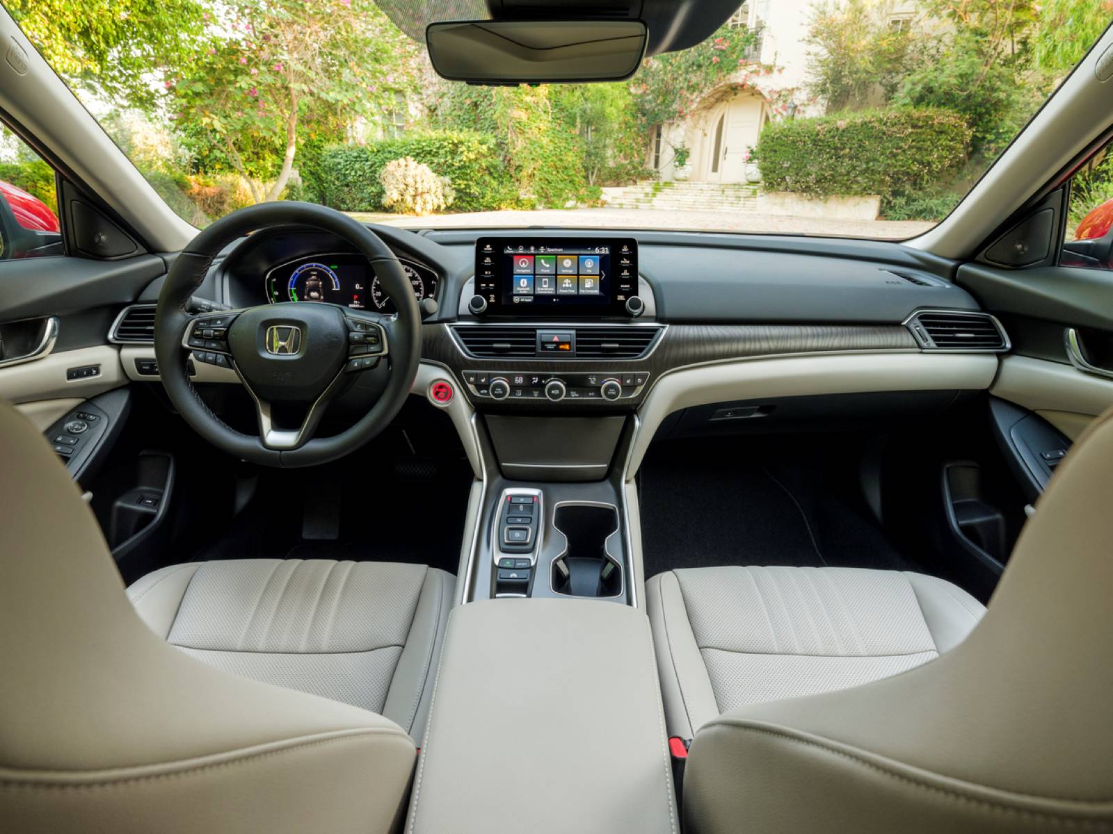 Interior shot of a 2022 Honda Accord Hybrid with a beige cloth interior