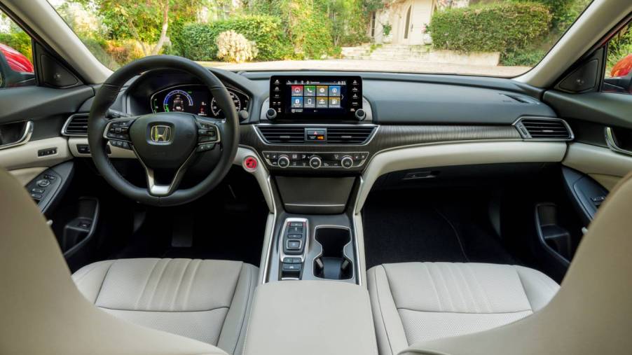 Interior shot of a 2022 Honda Accord Hybrid with a beige cloth interior
