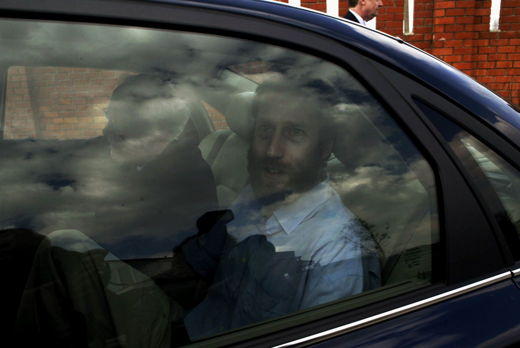 Kidnapped Dutch aid worker Arjan Erkel arriving by car to the Dutch embassy in Moscow, Russia