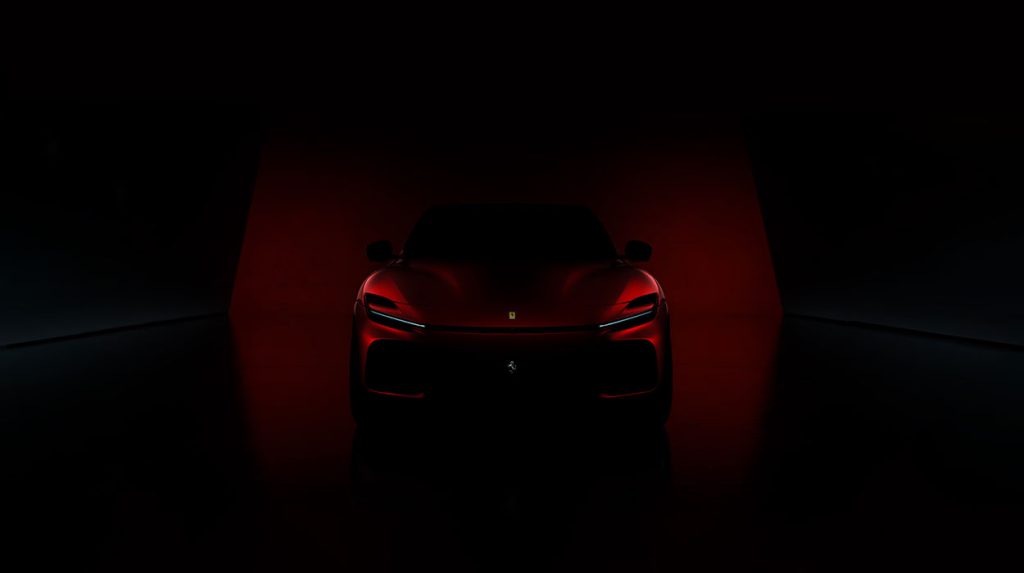 The front end of the new Ferrari Purosangue SUV in red.  