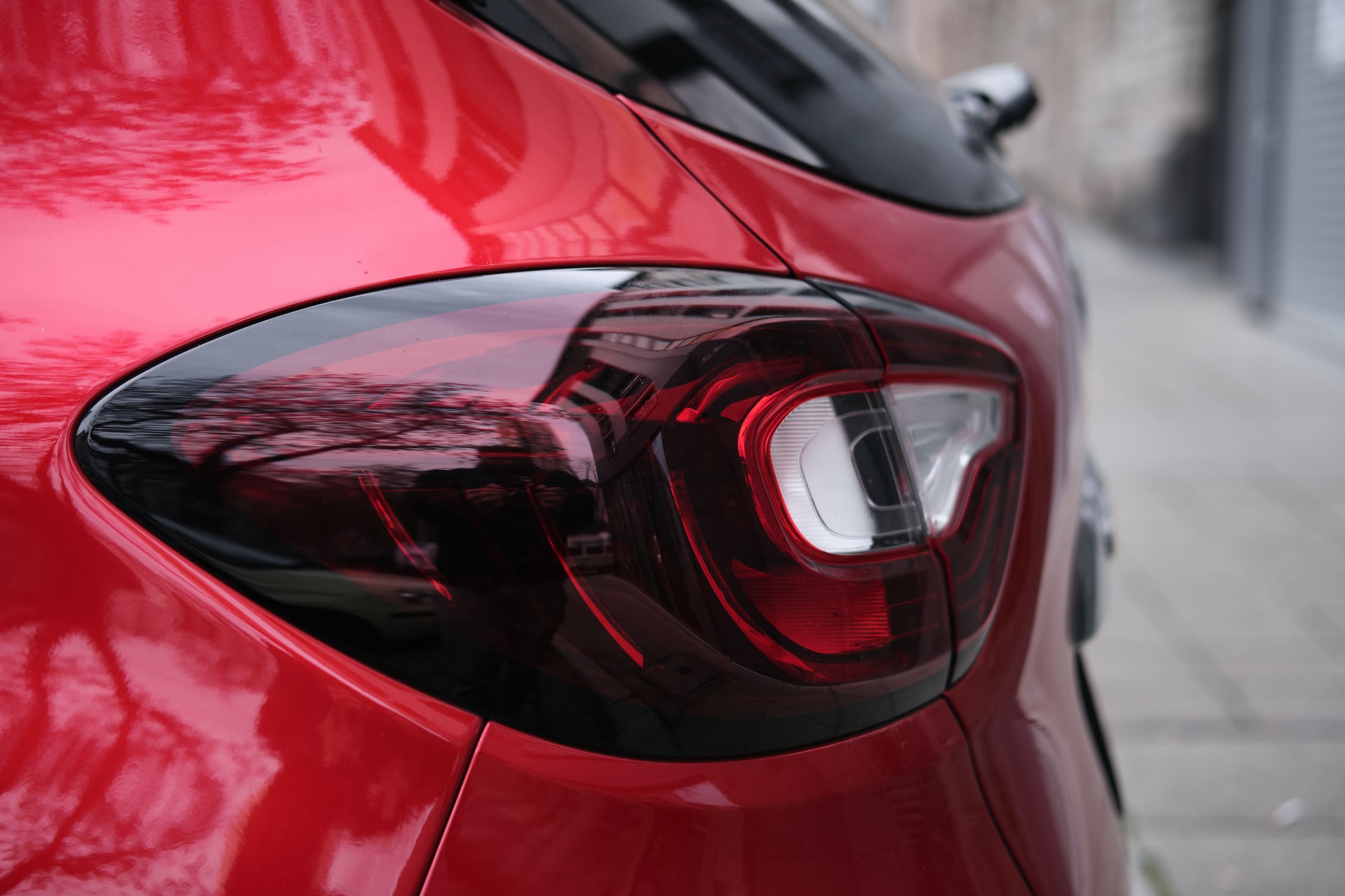 Close up of a taillight on a red car