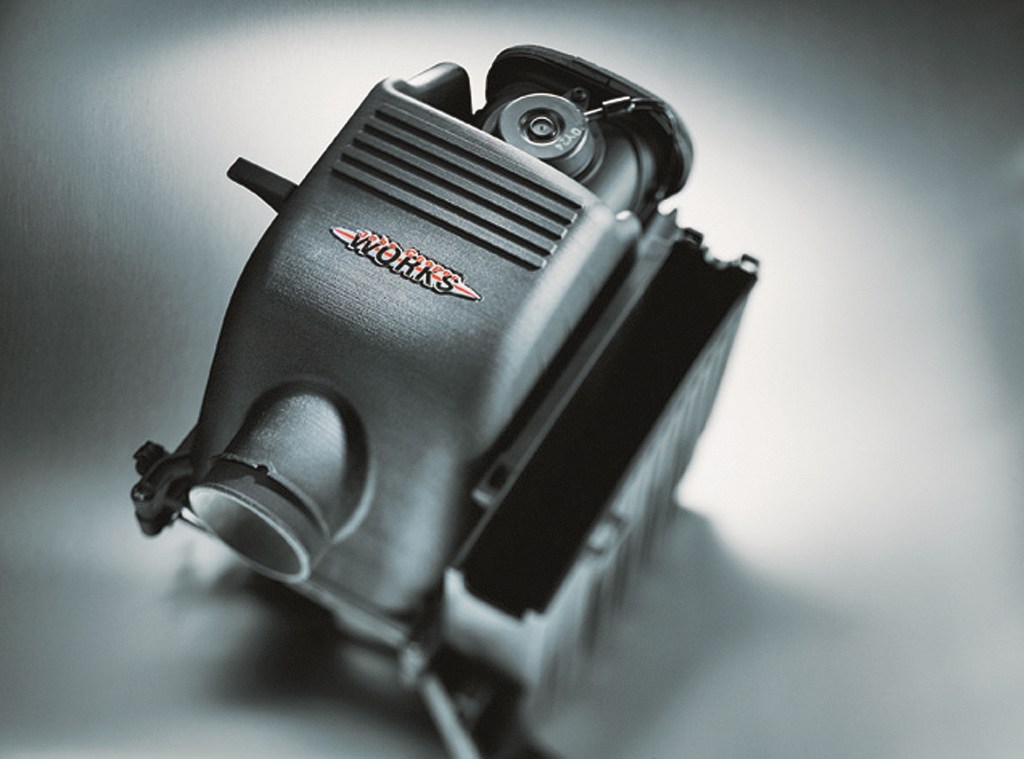 A black 2005 Mini Cooper S JCW air intake