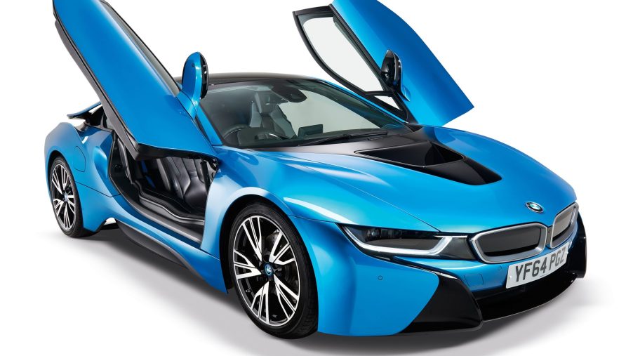 A blue 2015 BMW i8 with its gullwing doors up