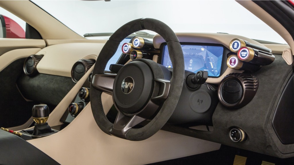 The tan-and-black dashboard and steering wheel of the 2017 TVR Griffith Prototype