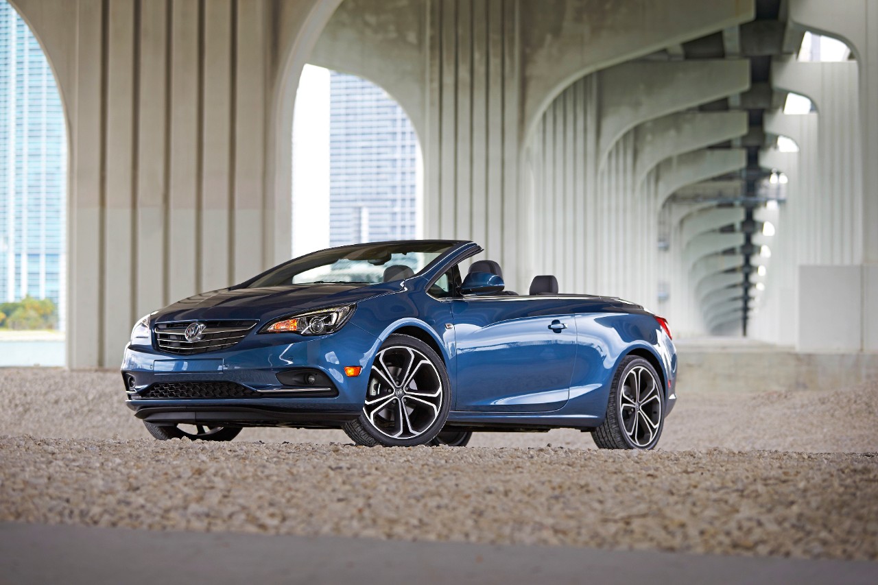 Blue 2019 Buick Cascada Convterible parked under freeway overpass