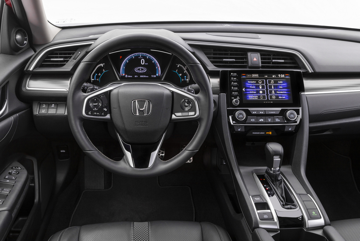 Interior of the 2020 Honda Civic Touring sedan with a black cloth interior
