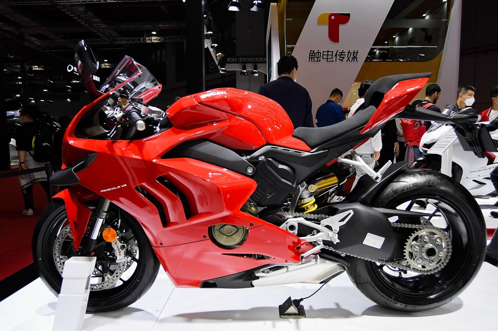 The side view of a red 2021 Ducati Panigale V4 at Auto Shanghai 2021