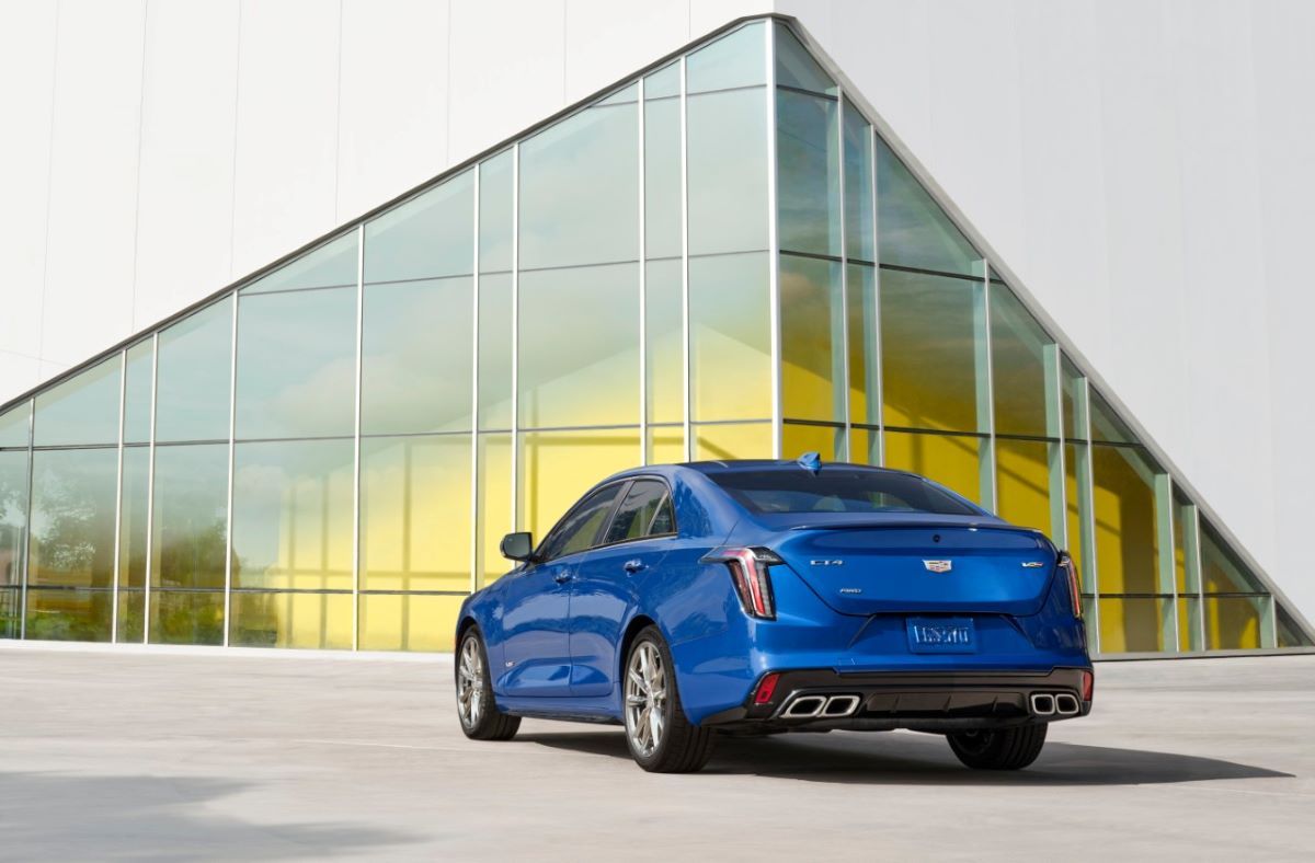 Rear corner shot of a blue 2021 Cadillac CT4, a luxury car with the best trunk space