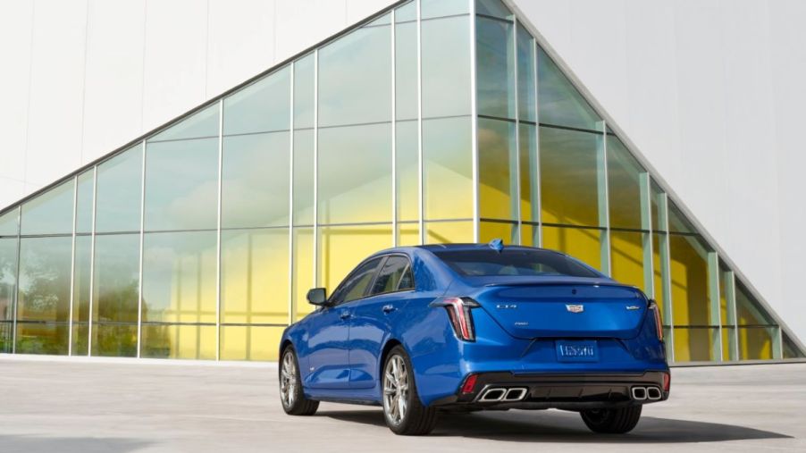 Rear angle shot of a blue 2021 Cadillac CT4, a luxury car with the best trunk space